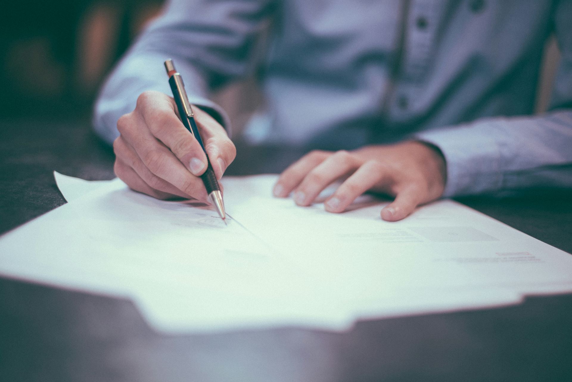 person completing a medication review form